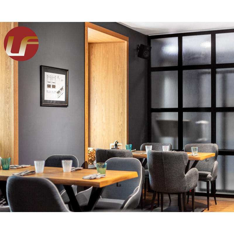 أثاث مطعم فاخر بتصميم حديث يشمل طاولات وكراسي